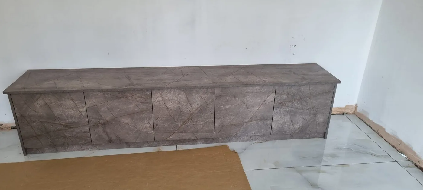 Stone-effect low ottoman bed base