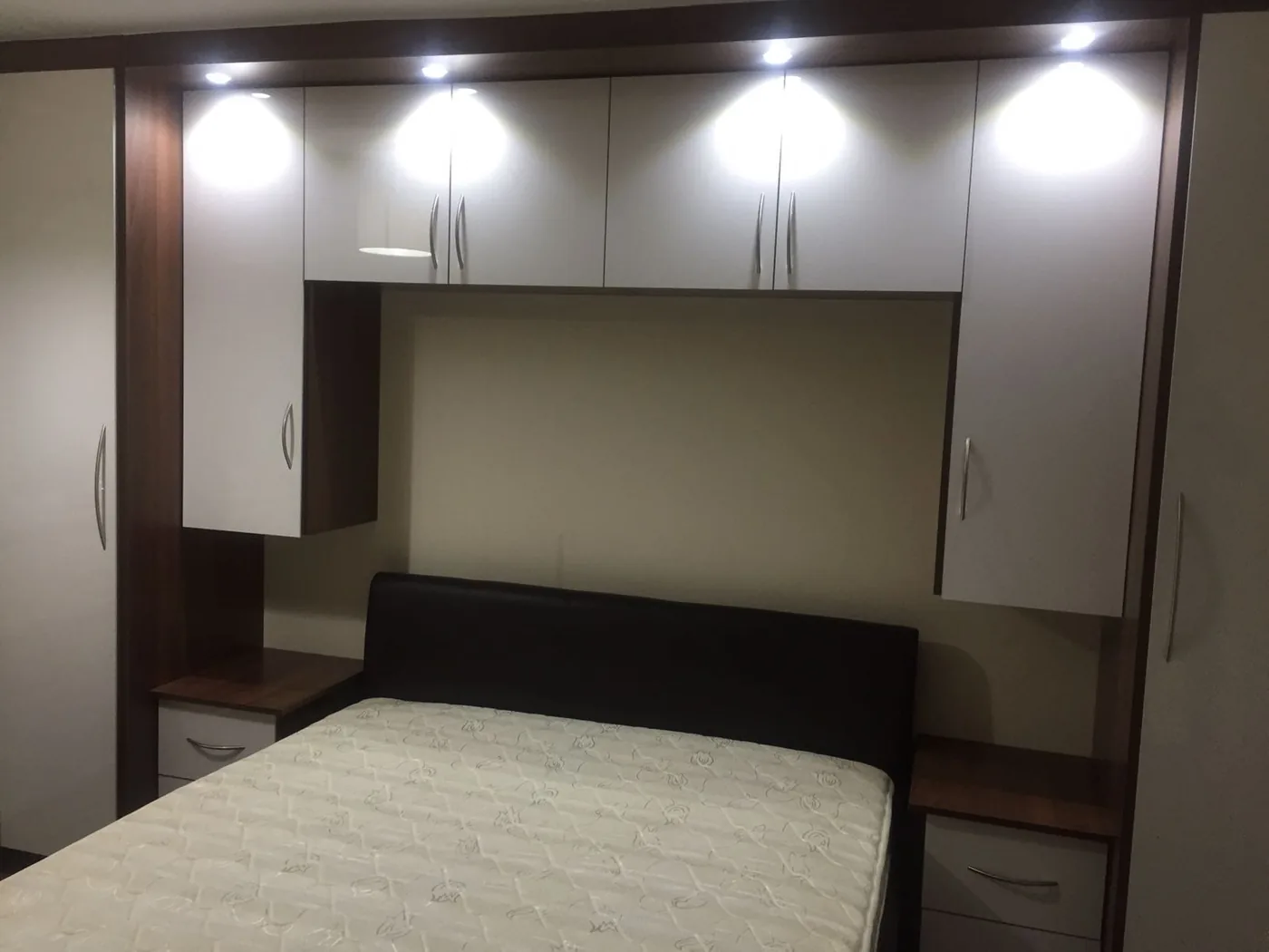 Cream gloss overbed wardrobes · walnut headboard nook