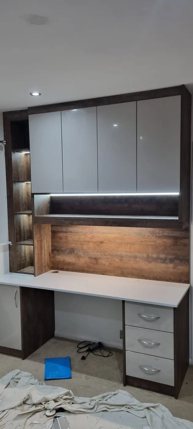 Walnut wall cabinets · matching desk nook · LED lighting