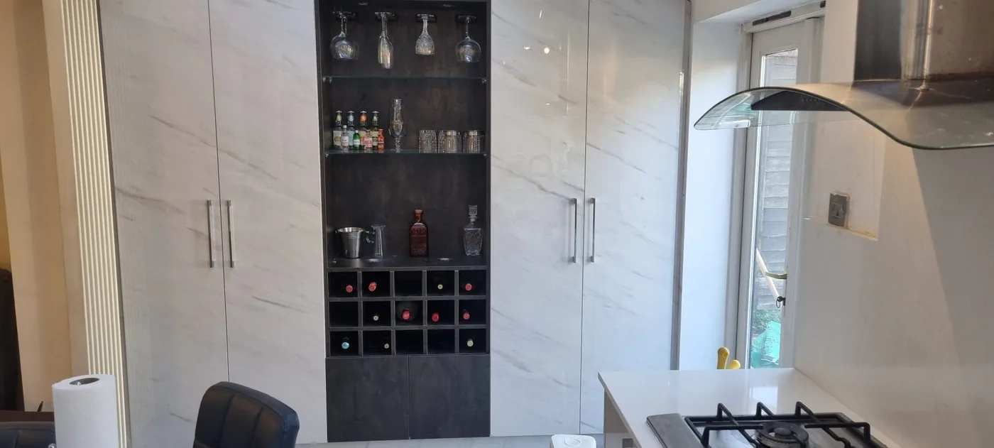 Built-in drinks cabinet · glass shelving & wine rack