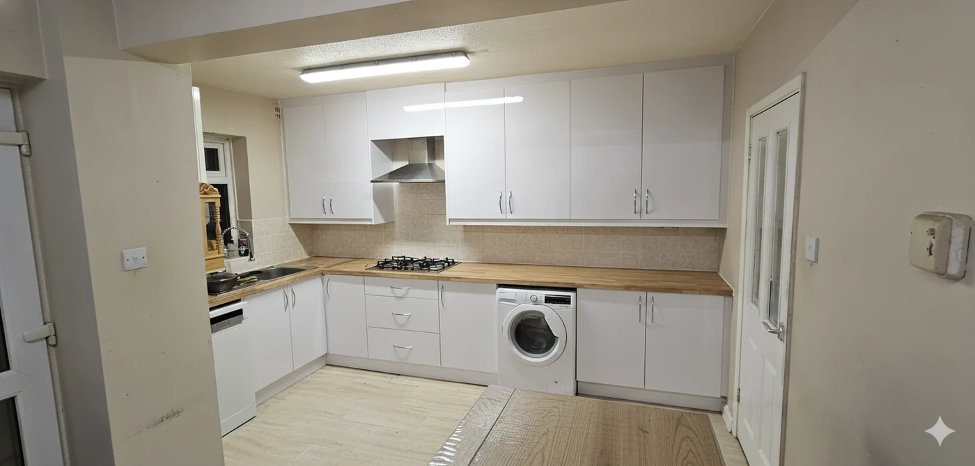 White galley kitchen · warm lighting