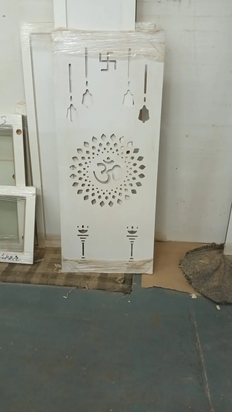 Mandir door panel · laser-cut Om, bell & diya motifs