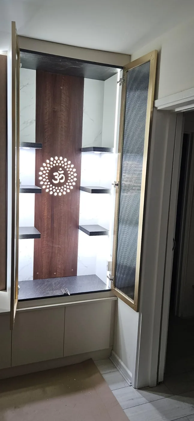 Walnut mandir cabinet · backlit gold Om