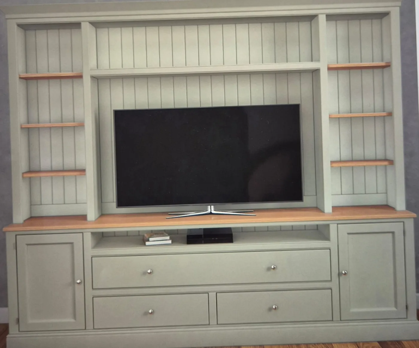 Sage green painted bookcase & media unit · oak shelf edges