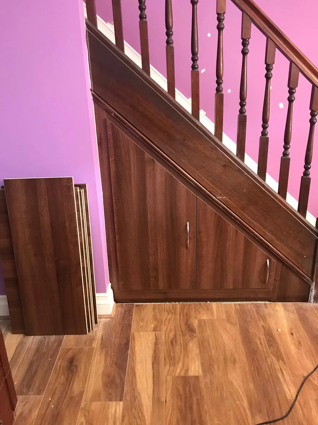 Walnut-veneer under-stair cupboard