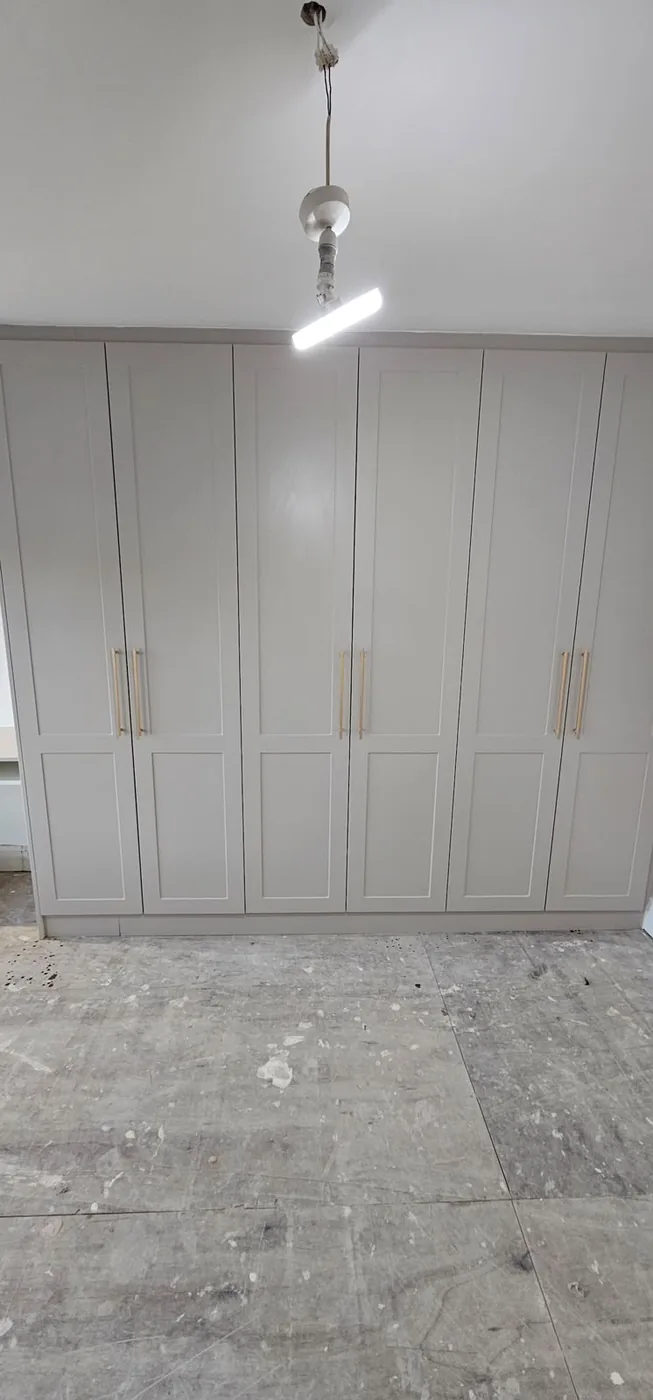 Pale grey fitted wardrobes · fresh install
