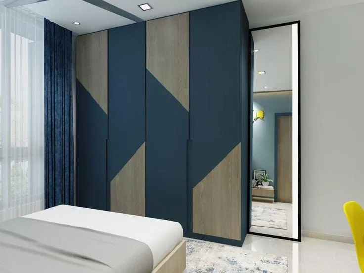 Navy geometric-pattern wardrobe · wood-effect inlay