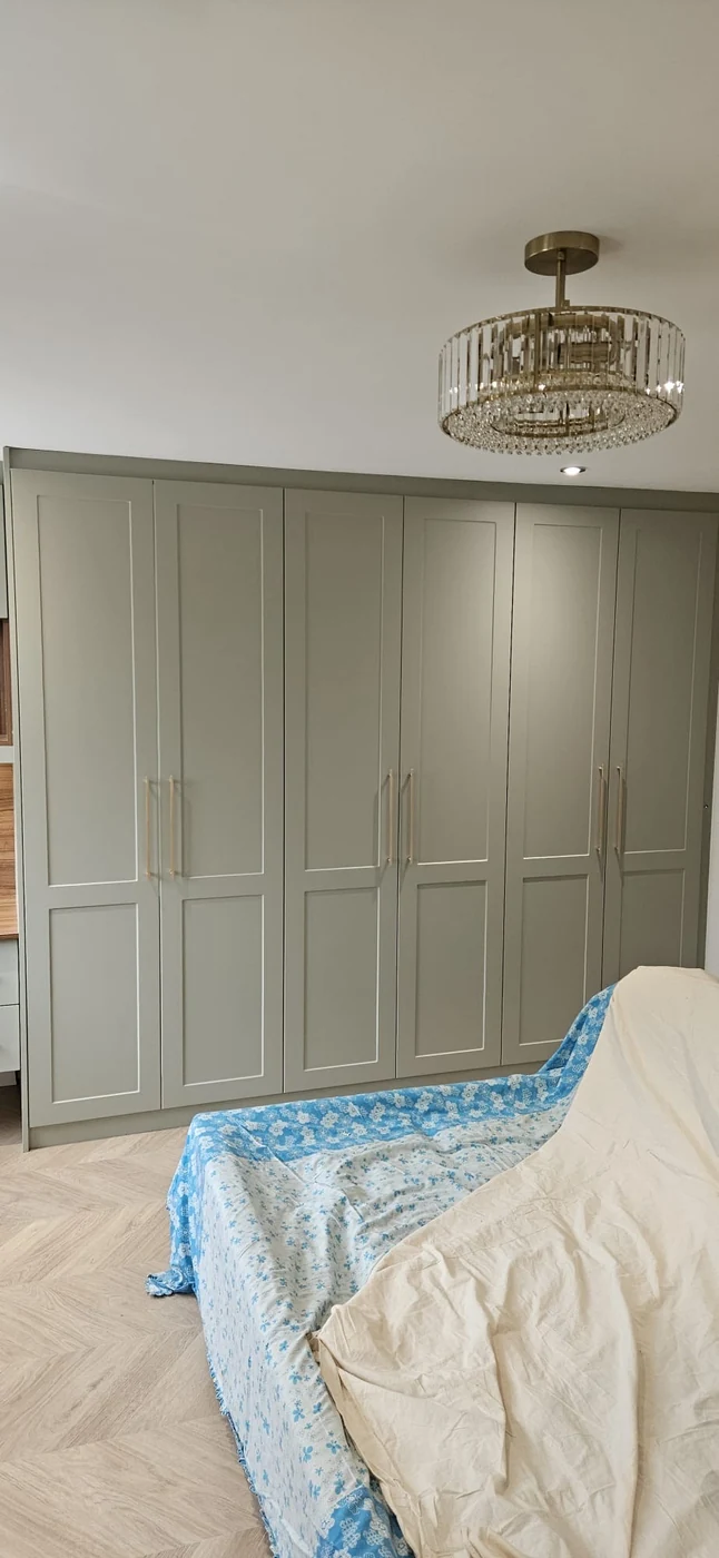 White & charcoal sliding wardrobe doors · three-panel